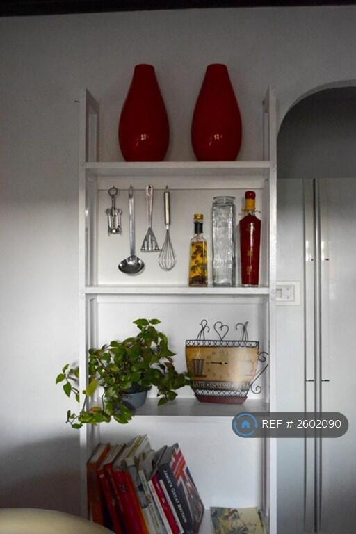 Kitchen With Breakfast Bar And New Appliances