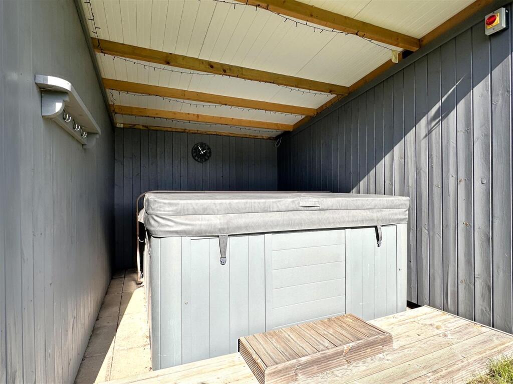 Covered Hot Tub/ Seating Area 420