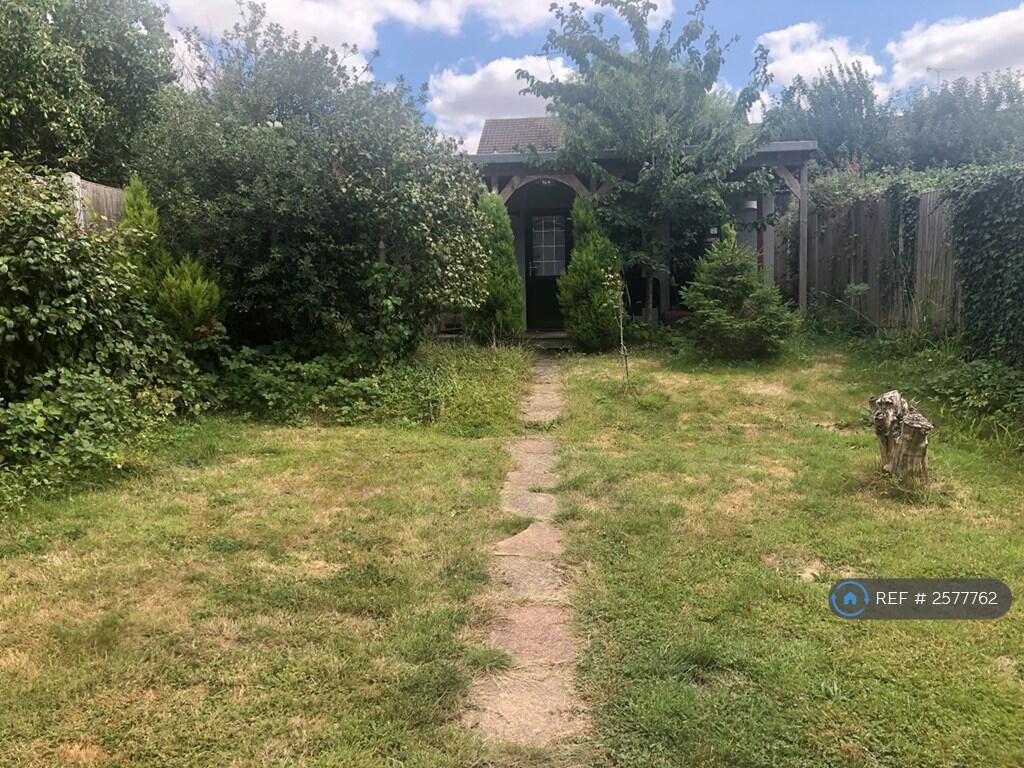 Back Garden And Summer House 