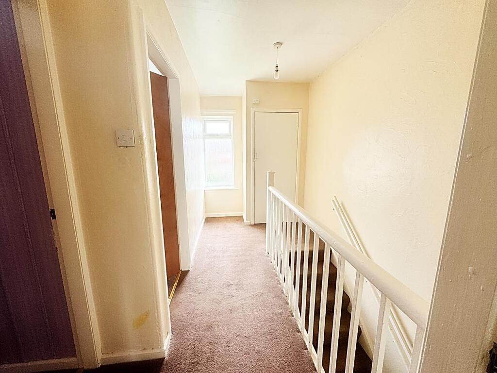 Stairs to first floor and Landing