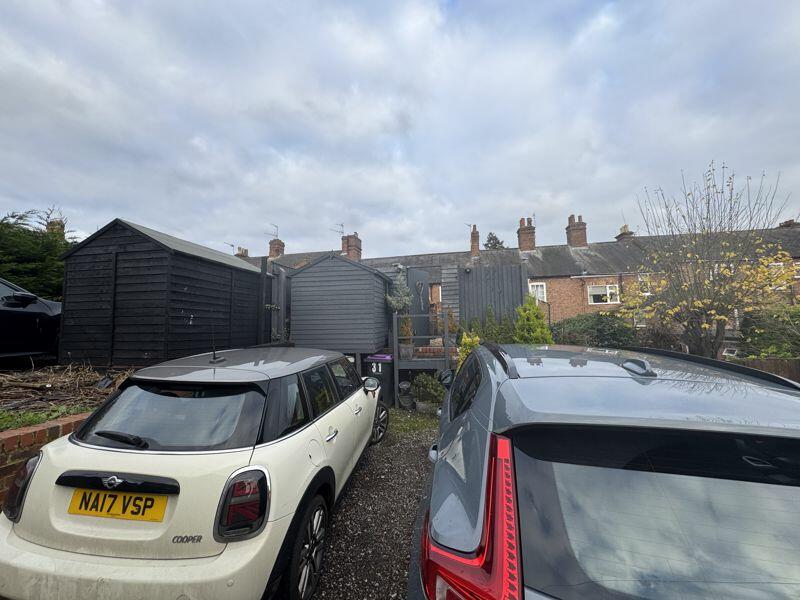 Two rear parking spaces