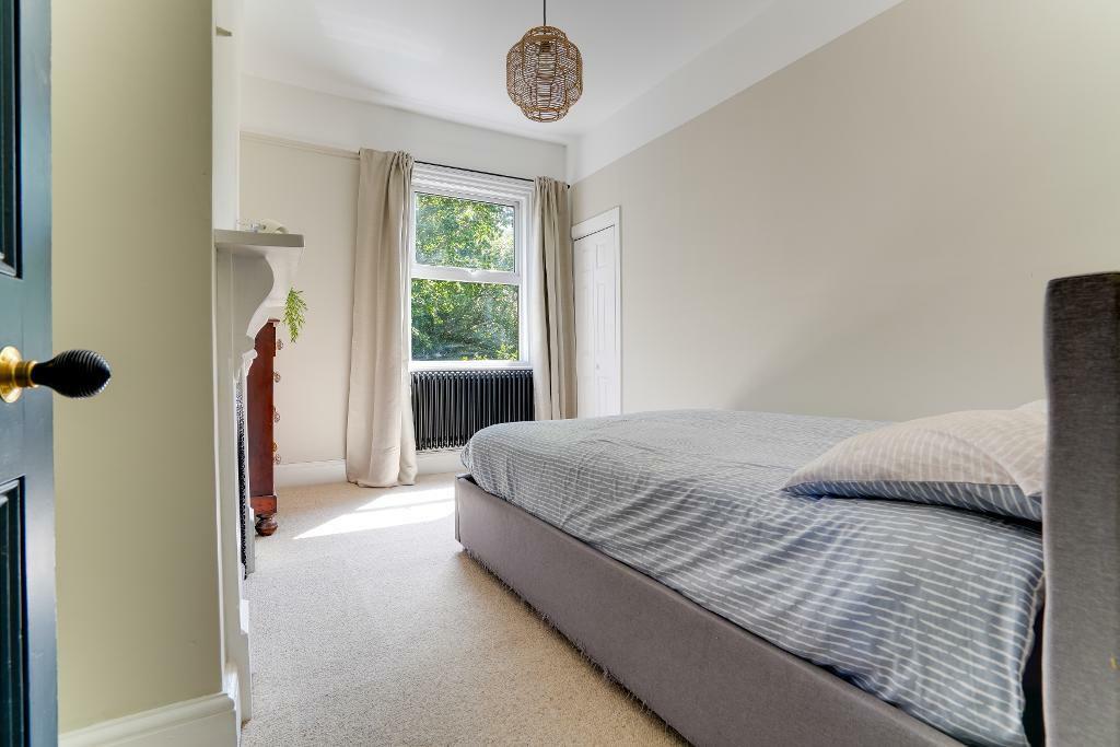 Bedroom 3 with feature fire place