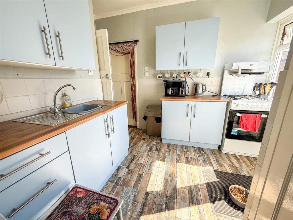 ALTERNATE VIEW OF KITCHEN