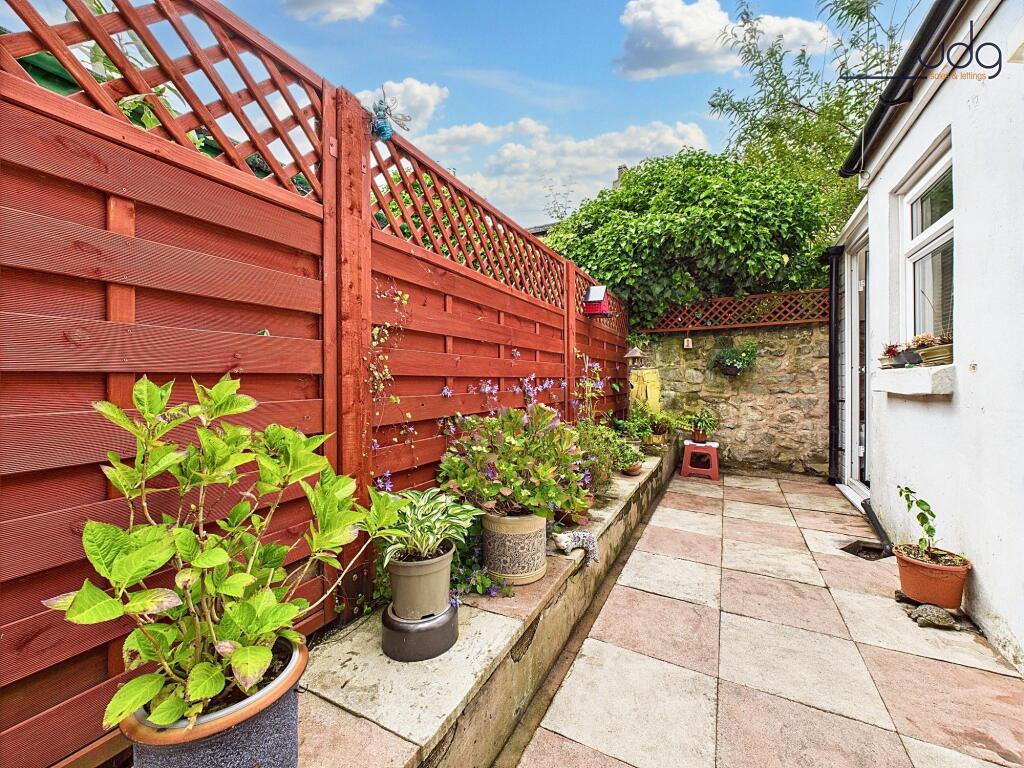 Larger than average yard and an attached outhouse/greenhouse