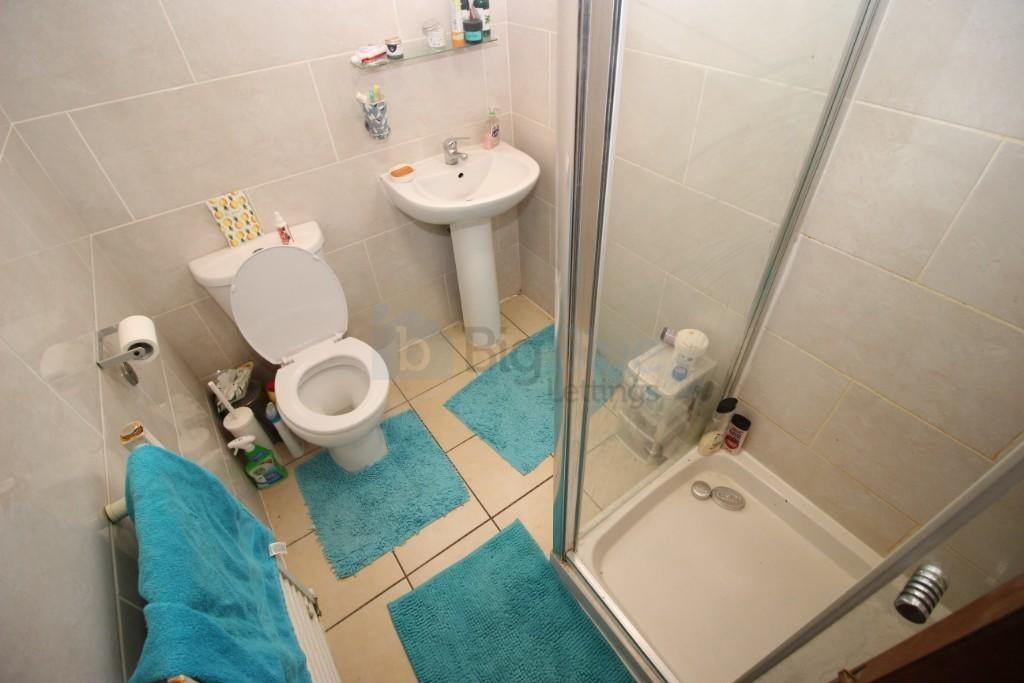 A neat and well-maintained bathroom featuring a...