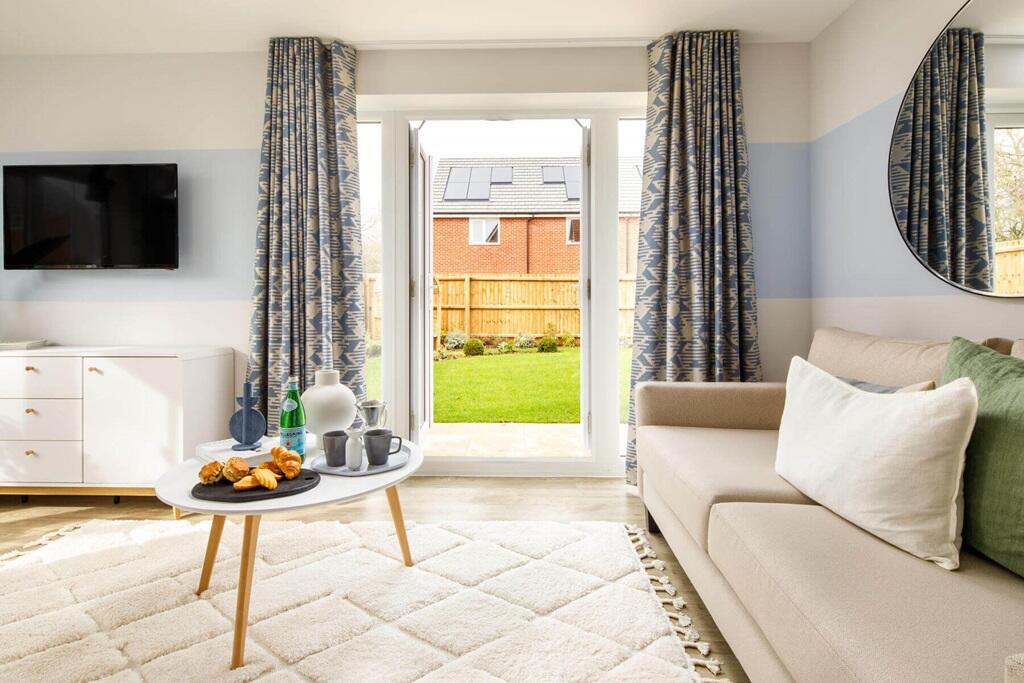Double doors also lead from the lounge to the garden