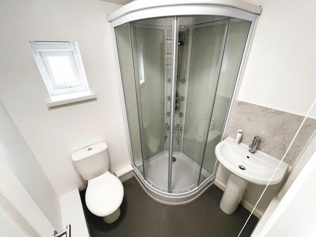 Upstairs shower room.