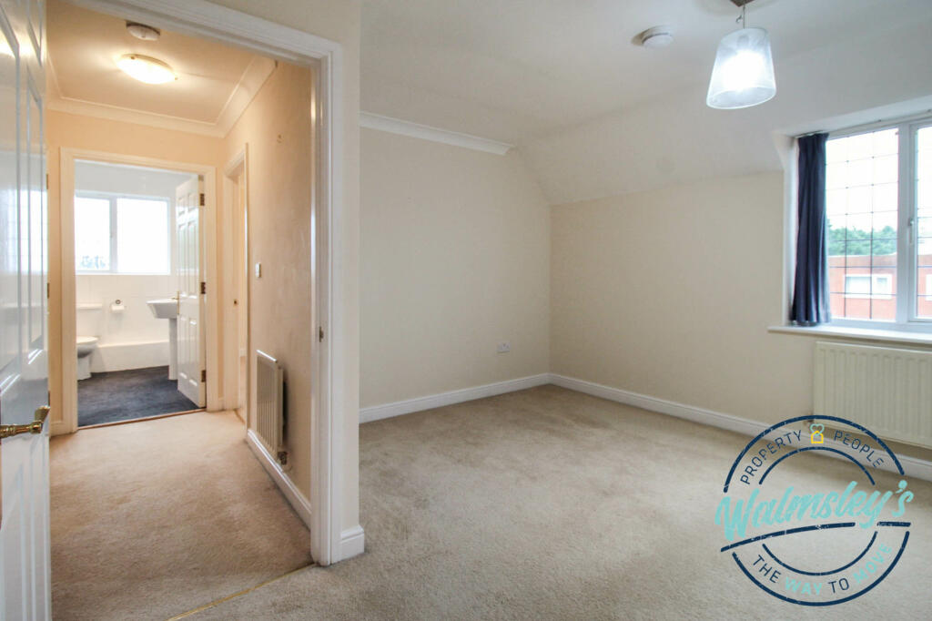 Bedroom one with landing beyond
