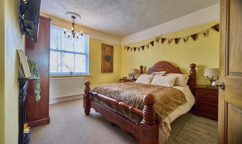 FRONT BEDROOM ONE