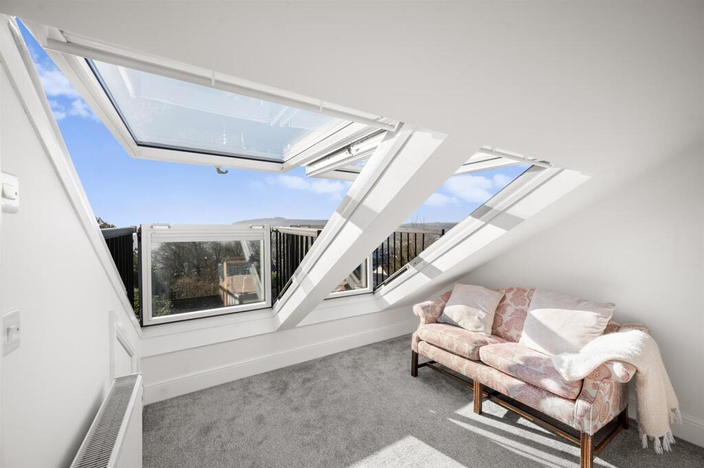 Bedroom Four - seating and balconies.jpg