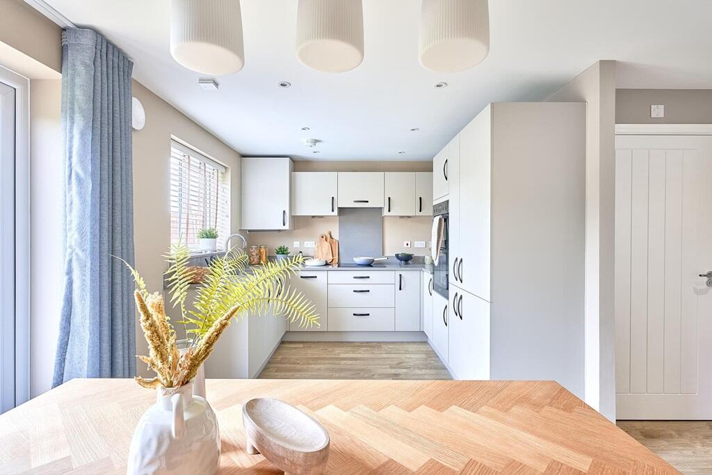 A sociable open plan kitchen/diner with French doors to the garden