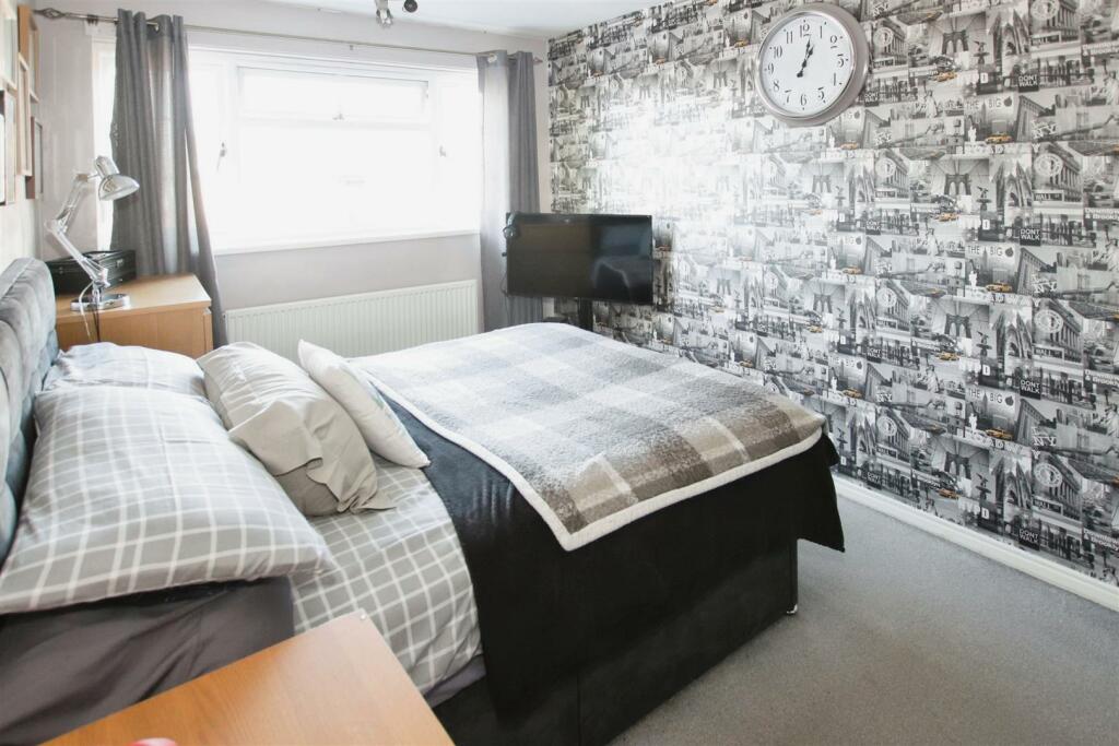 BEDROOM ONE (FRONT)
