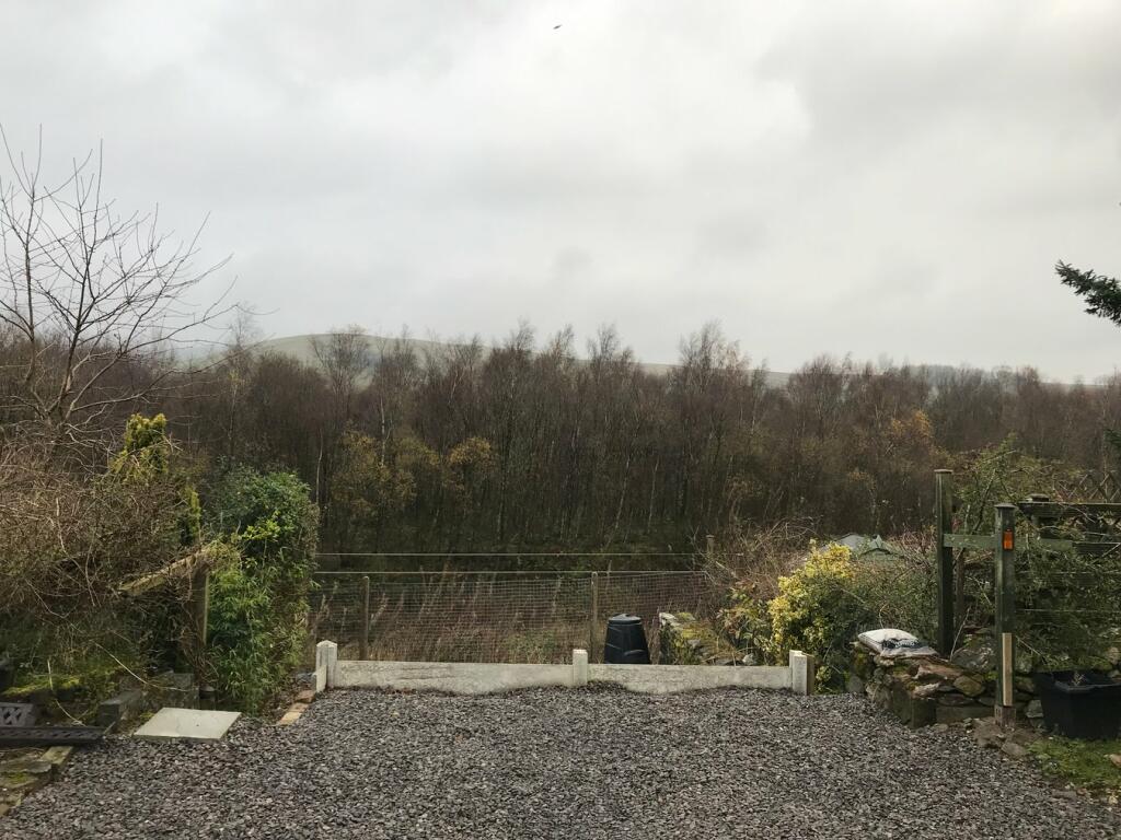 Car Parking And Lower Gravel garden