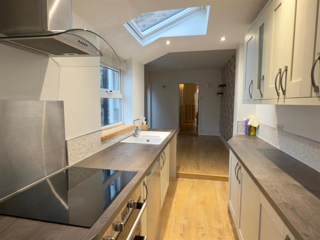 Kitchen To Breakfast Area.jpg