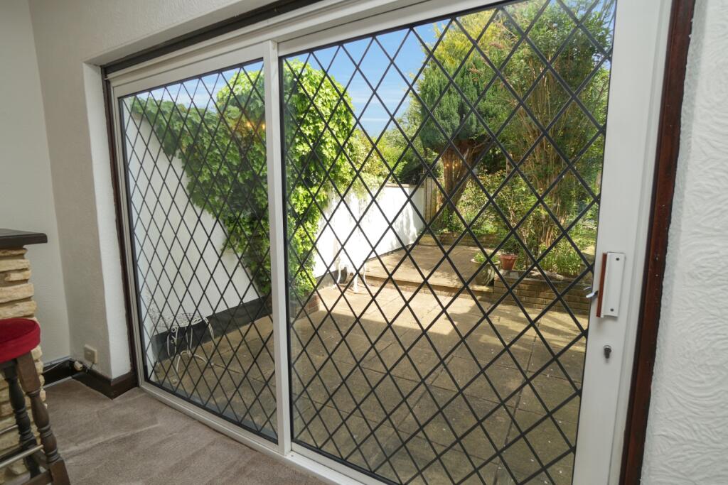 Patio doors through to rear garden