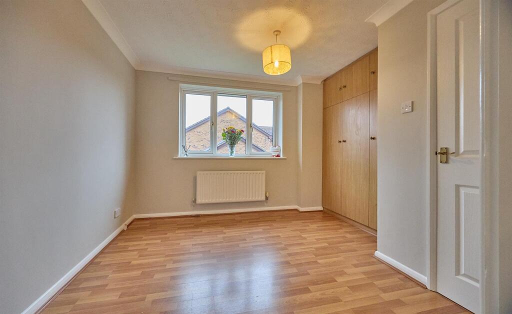 BEDROOM ONE TO REAR