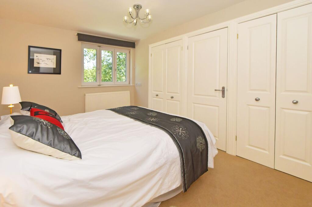 Bedroom one fitted wardrobes