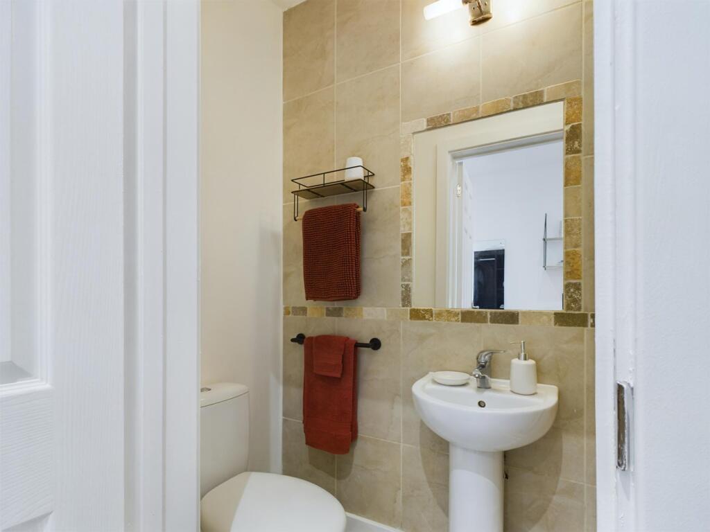 A modern and clean bathroom featuring stylish t...