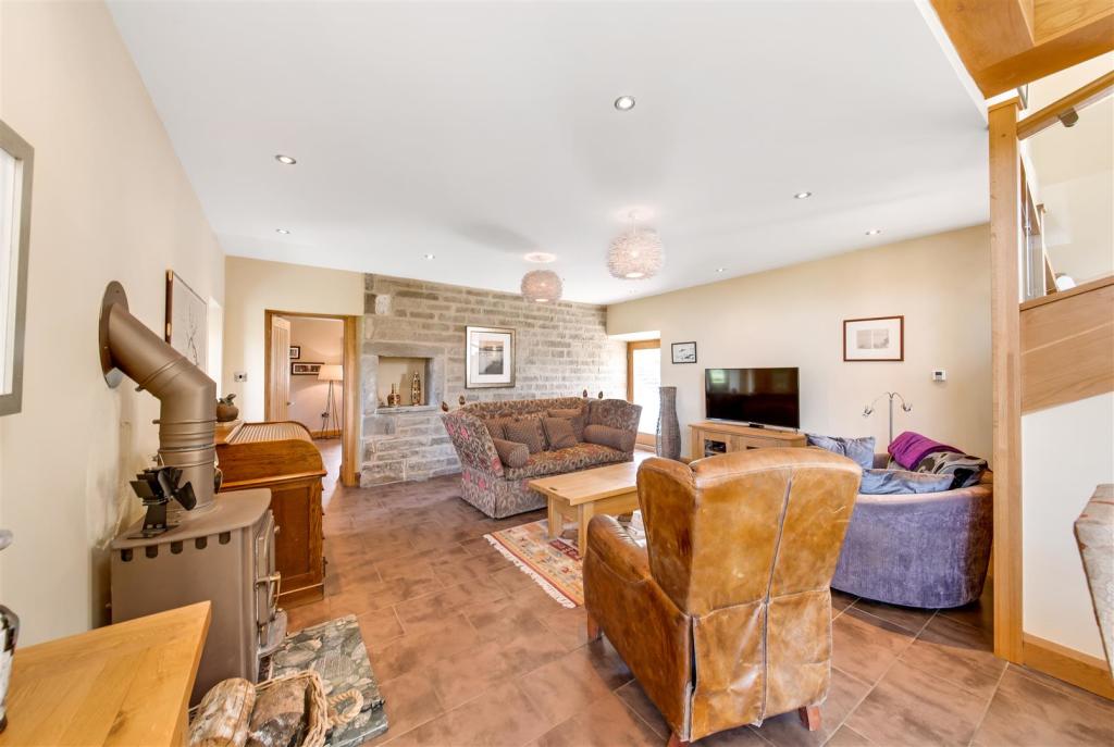 LIVING, DINING, SITTING AREAS AND SNUG