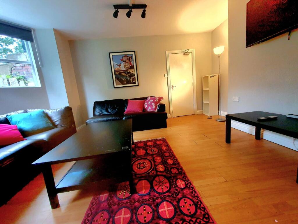 A cozy and inviting living room with warm woode...