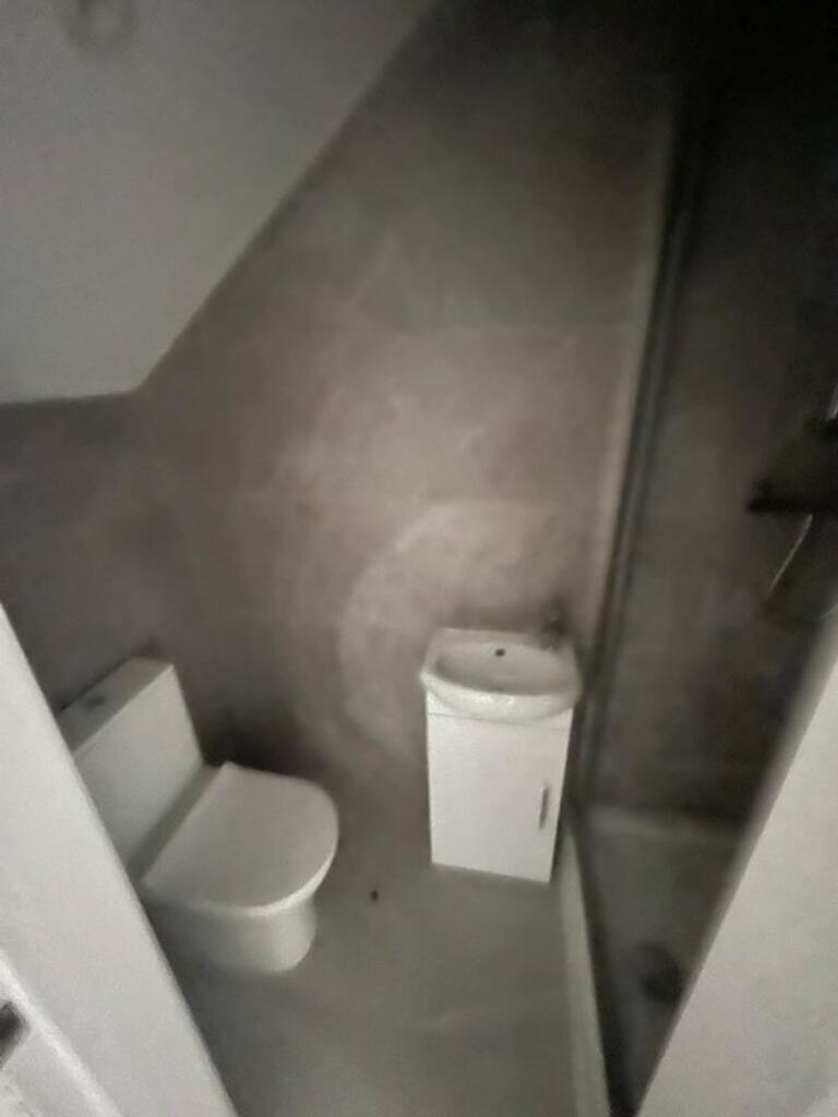 A modern single toilet featuring sleek design a...