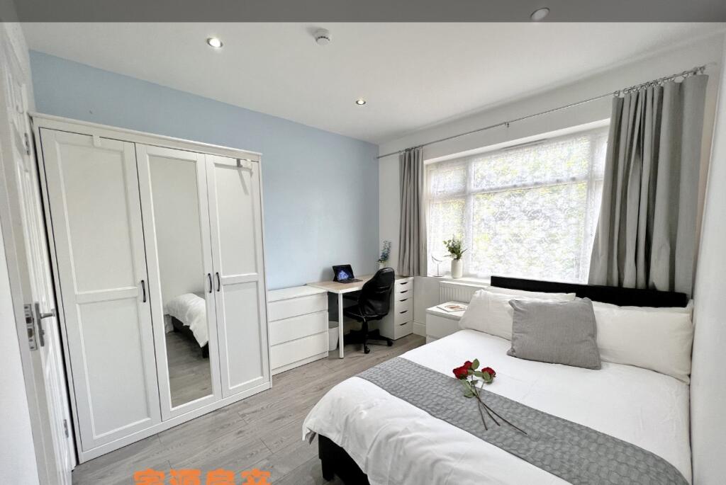 Bright and inviting master bedroom featuring a ...