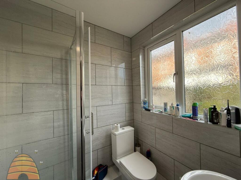 A modern and well-maintained bathroom featuring...