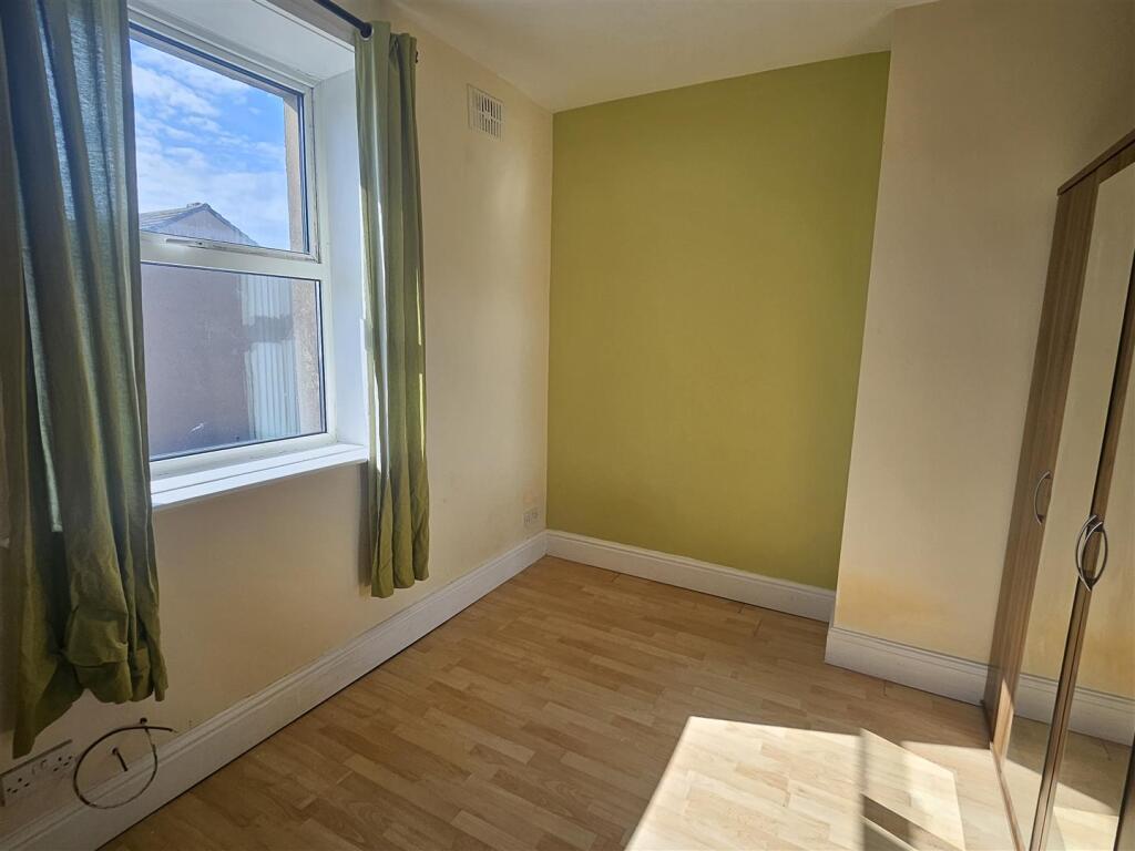 BEDROOM ONE (FRONT FACING)