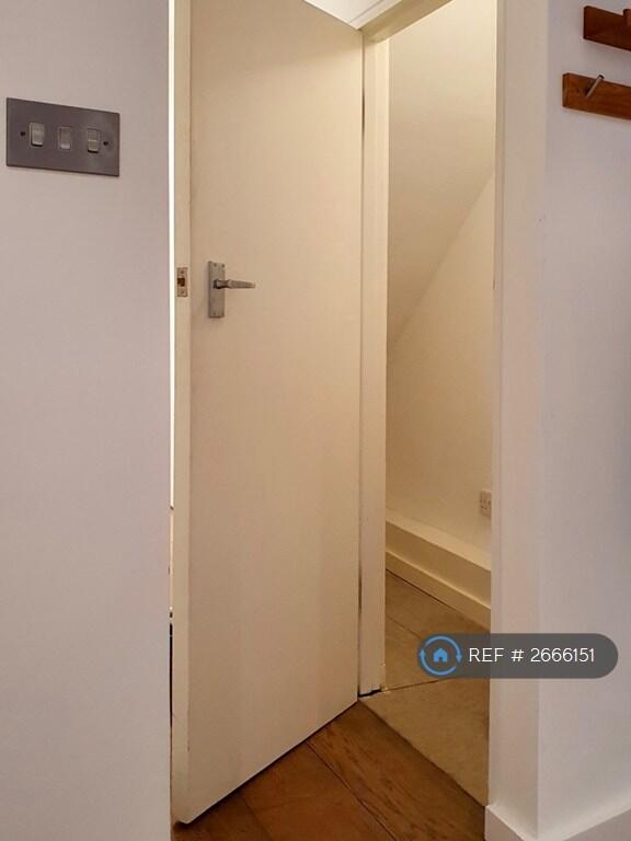 Entrance Hall Storage Cupboard 
