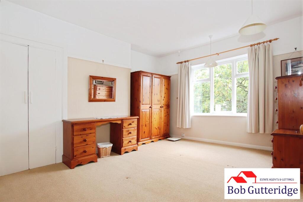 BEDROOM ONE (FRONT)
