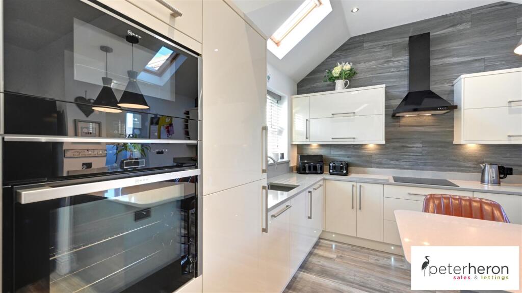 Open Plan Dining Kitchen And Family Area