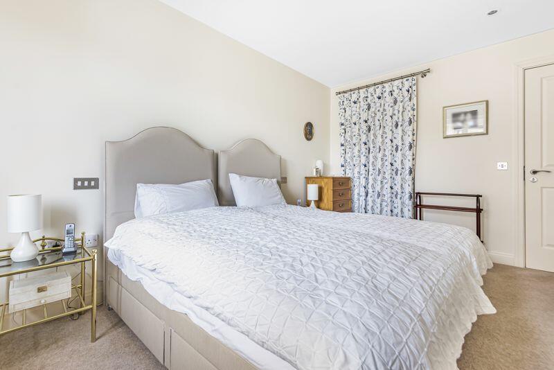 Master bedroom with walk-in wardrobe ...