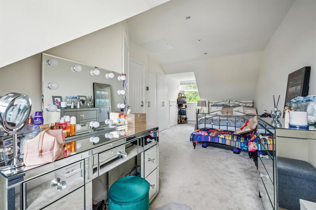 Bedroom Three - dressing area towards bed.jpg