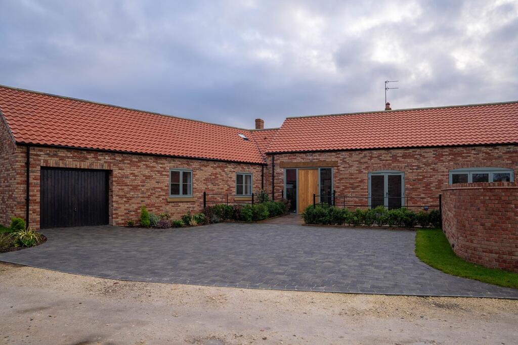Integral single garage with provision for EV charger