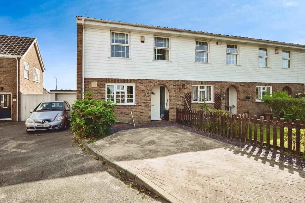 Front View Of The Property With Driveway Parking
