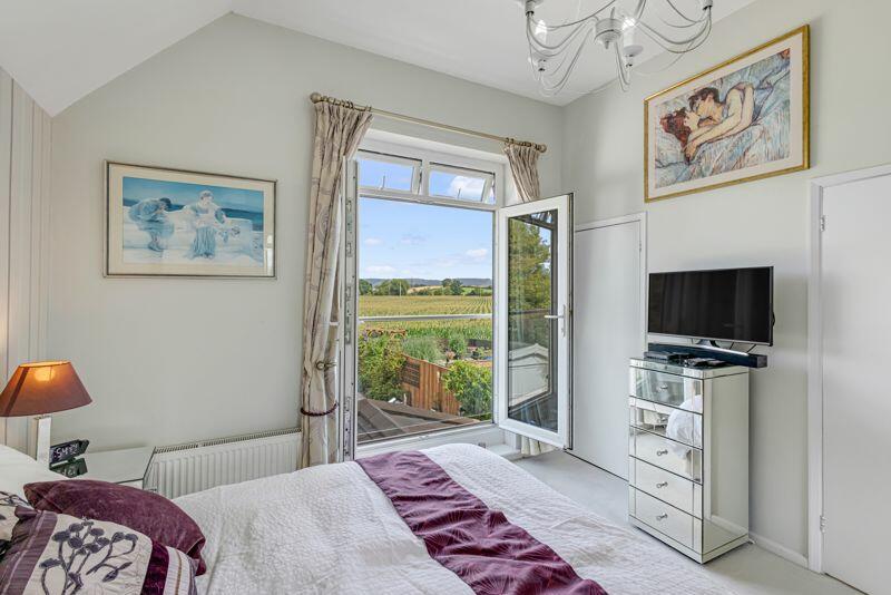 MAIN BEDROOM WITH EN-SUITE