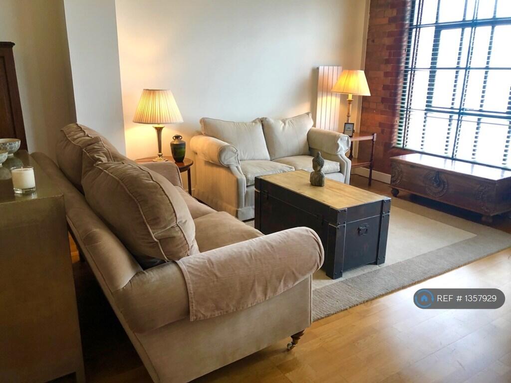 Living Room With Ceiling To Floor Windows