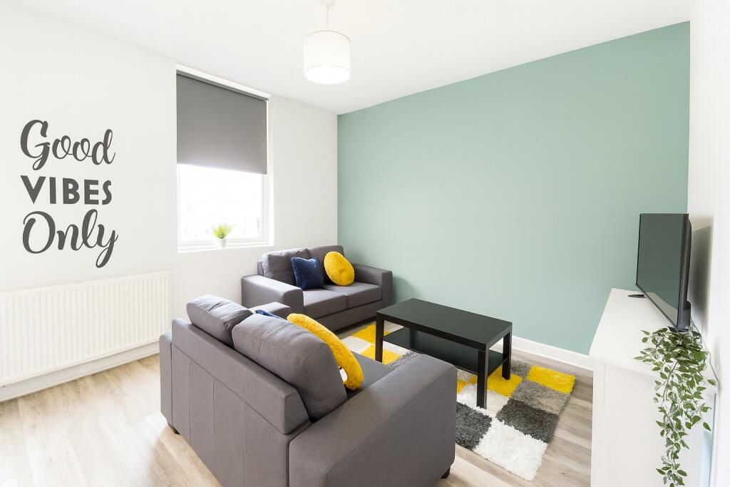 Bright and inviting living room featuring moder...