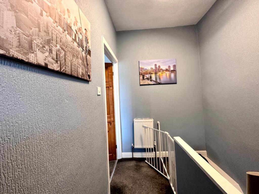 TO THE FIRST FLOOR LANDING