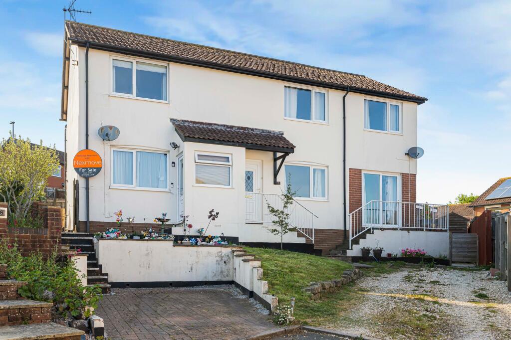 Parking space to the front of the property