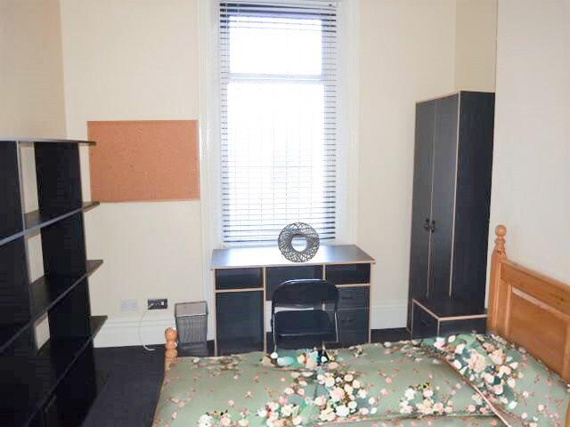 bedroom with green b