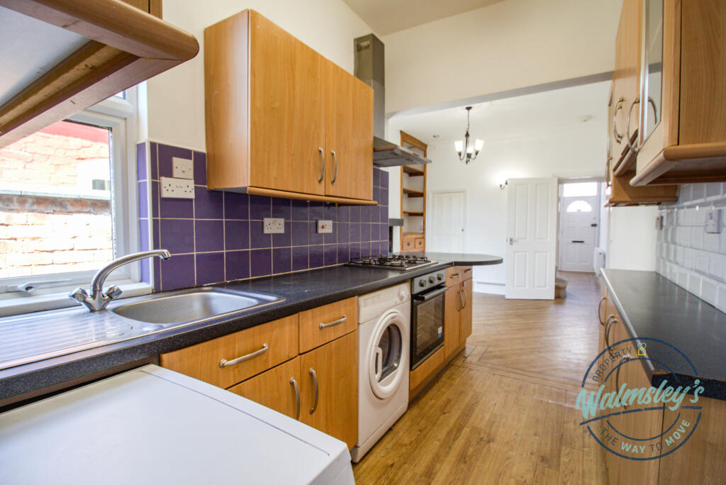 Kitchen open plan to rear reception room