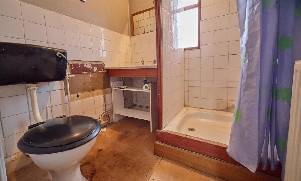BATHROOM TO FRONT
