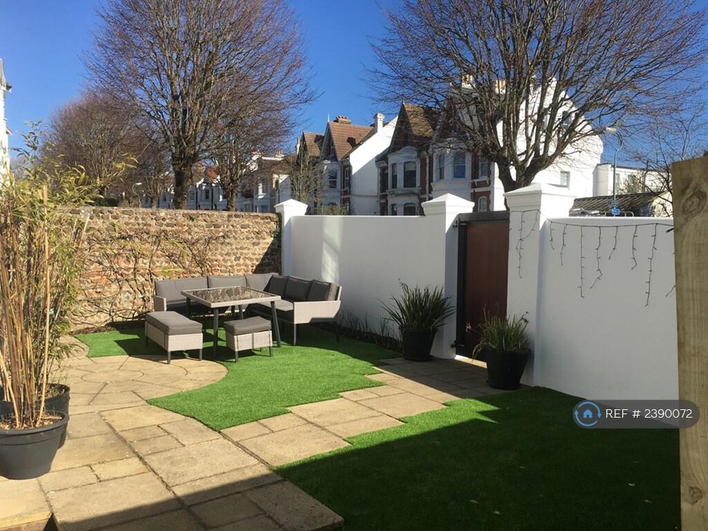 Tiled And Astroturf Areas