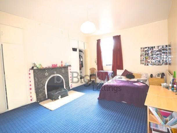Bright and inviting master bedroom featuring a ...