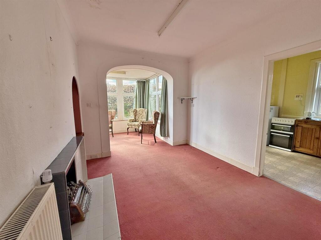 Dining room to kitchen and sun room
