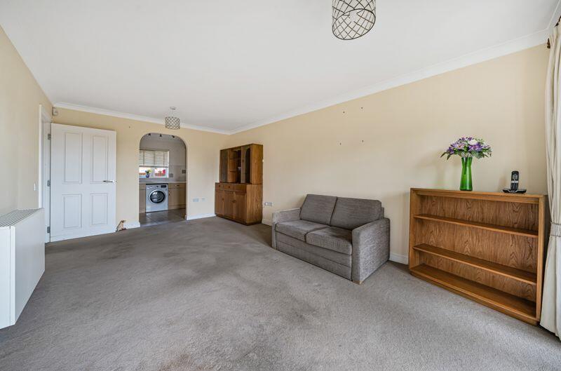 Living/dining room through to kitchen