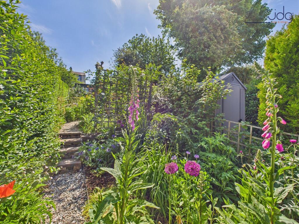 Beautiful Tiered Garden and Blooming Flowers