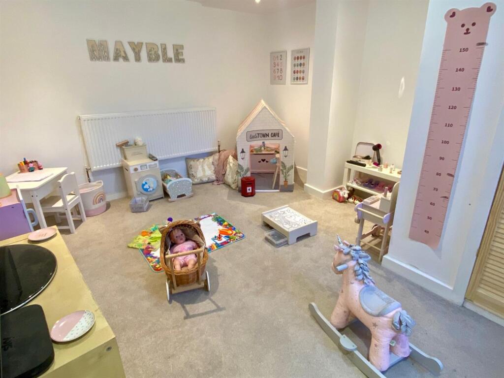 converted cellar into playroom-utility-home office