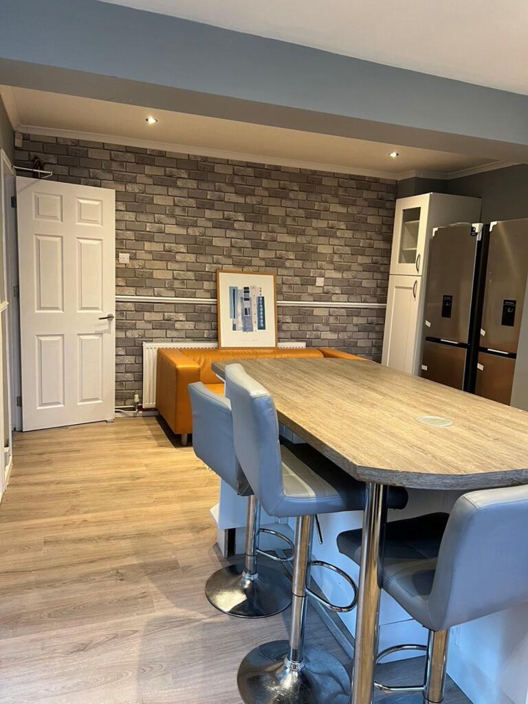 A modern and inviting kitchen area with ample s...